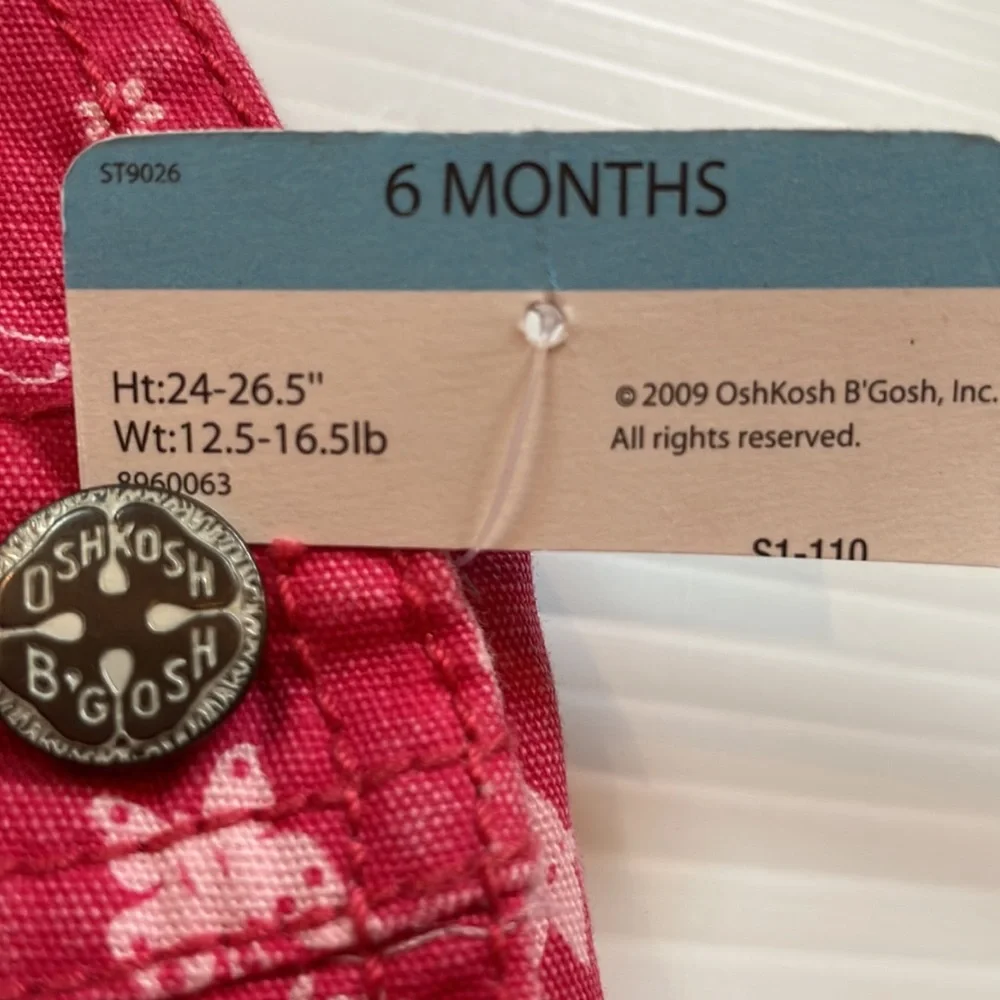 Oshkosh B’gosh pink bib overalls with butterflies, size 6 months